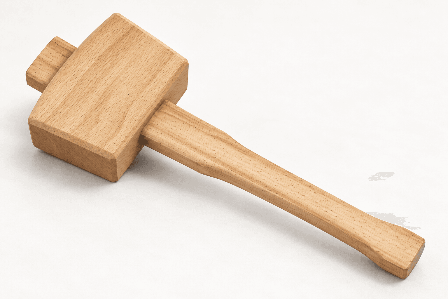 Original brand-neutral three-quarter rendering of a complete solid-beech joiner's mallet with raked rectangular head, chamfered striking edges and tapered through-handle.