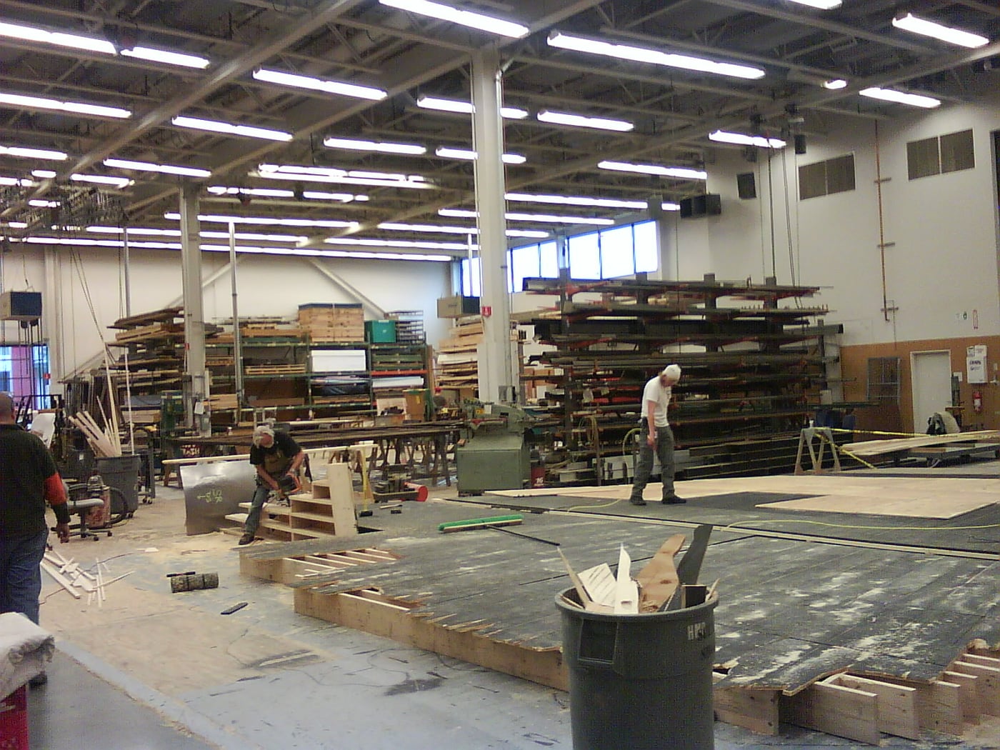 Workers constructing a theater set in the Guthrie Theater scene shop
